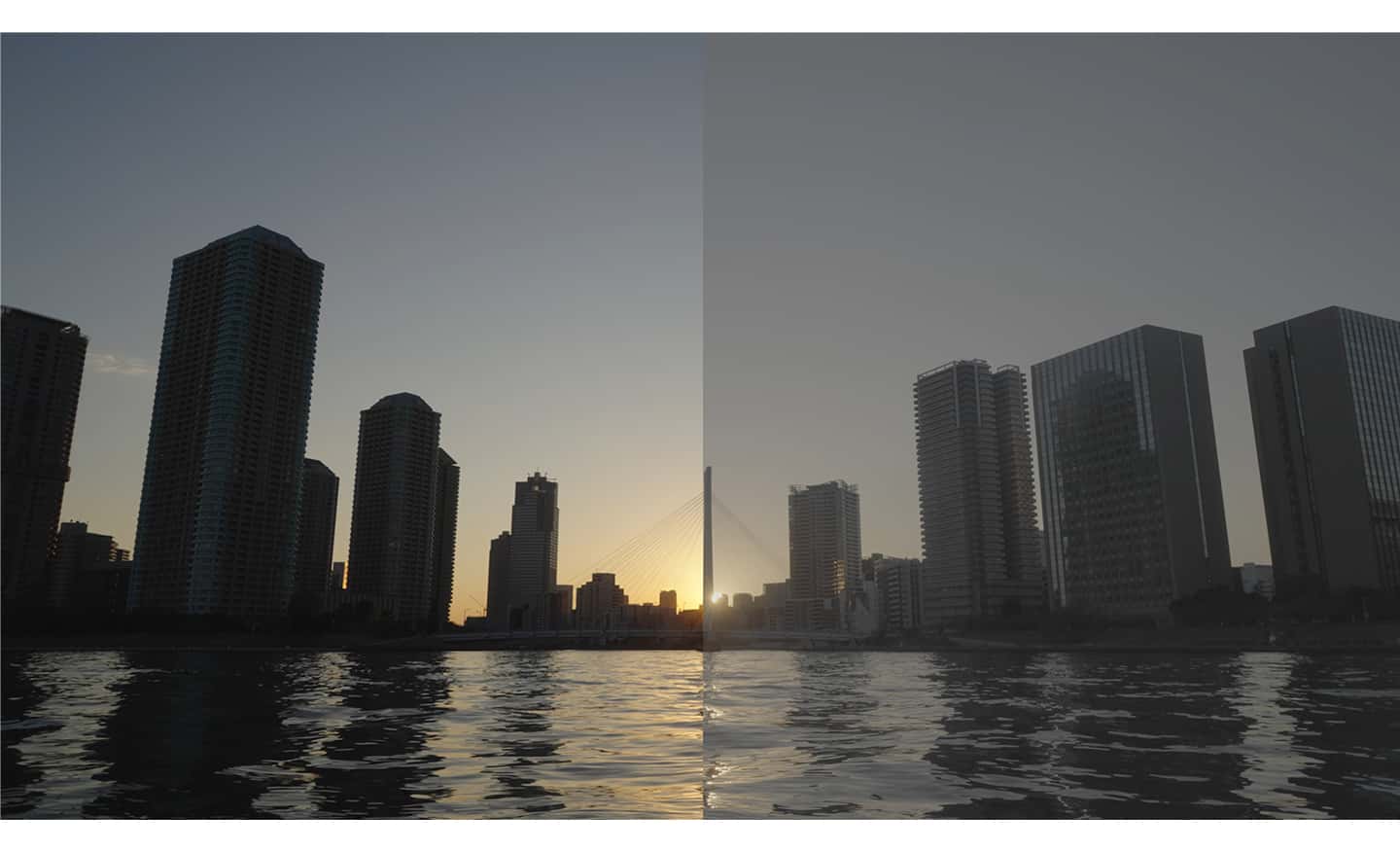 Imagen de ejemplo en la que se muestran edificios reflejados en el agua, con S-Log3 aplicado en la mitad izquierda, pero no en la mitad derecha