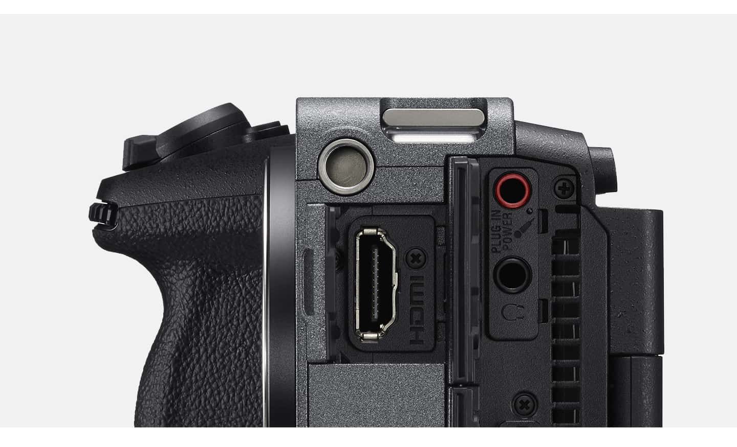 Imagen de producto en la que se muestra la vista lateral de la FX3 con un puerto HDMI y terminales de micrófono y auriculares